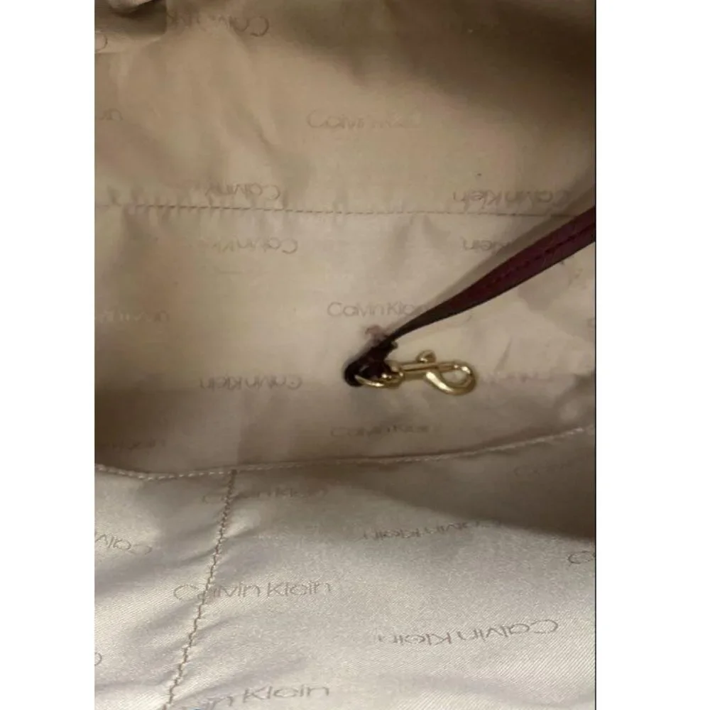 Calvin Klein Burgundy Saffiano Leather Top Zip Bag with Synthetic Trim